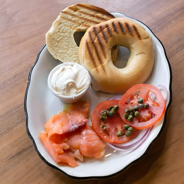 Zaca Cafe's toasted bagel with cream cheese, smoked salmon, sliced tomatoes, red onion, and capers.